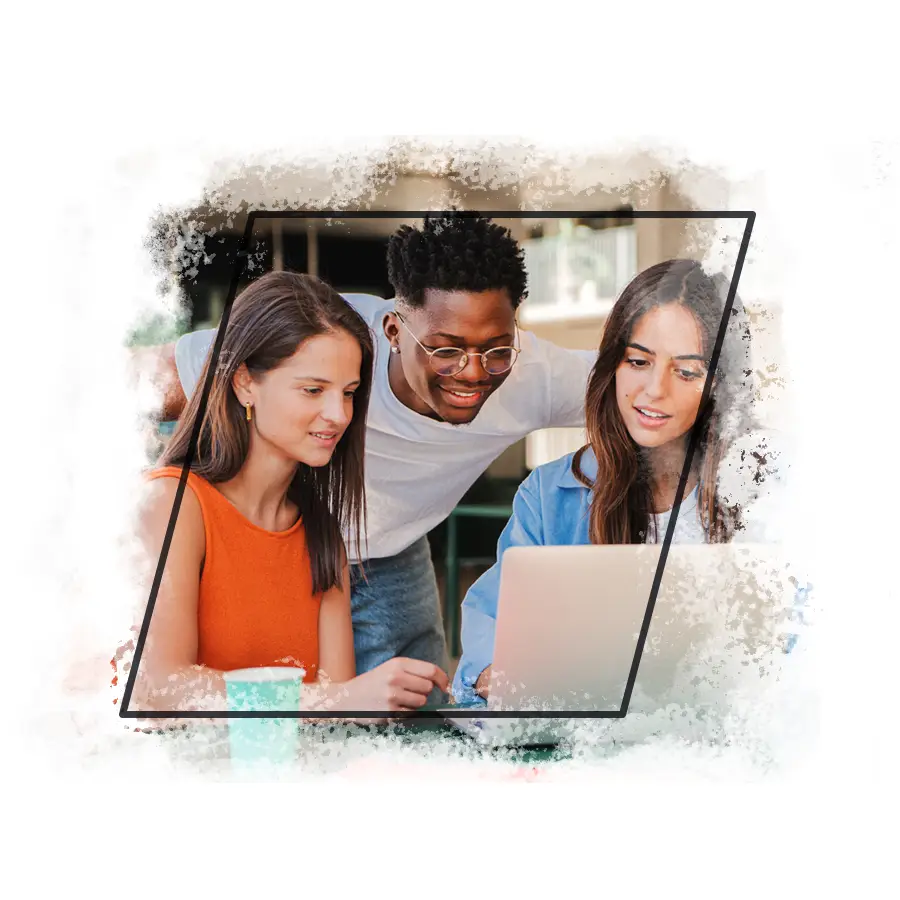 Three highschool students looking at a computer laptop.